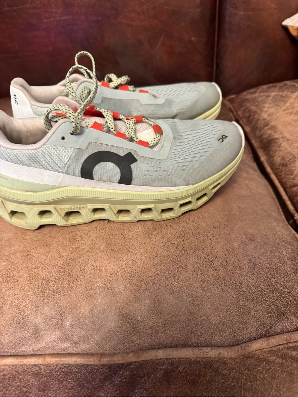 ON Running Shoes. Grey/Green with Orange Accent. Cloudmonster.